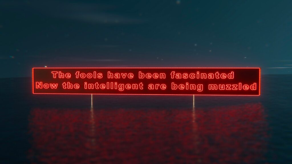 panneaux lettres rouges lumineux texte "the fools have been fascinated, now the intelligent are beingmuzzled"